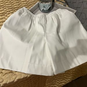 White leather shorts